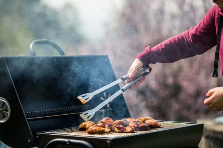 woman grills some kind of marinated meat and vegetable